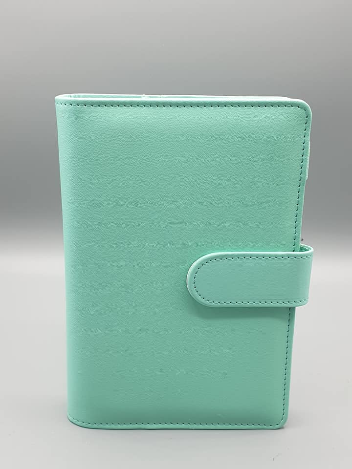 A6 Binder with four plastic zip pouches